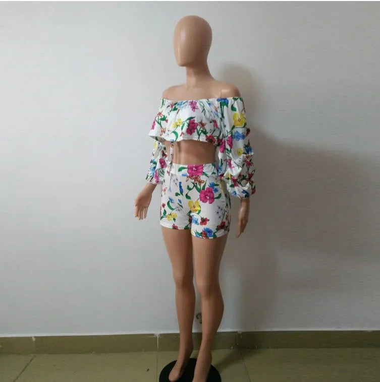 Women's multicolour digital print two-piece set with textured pile sleeves on the top and matching shorts.