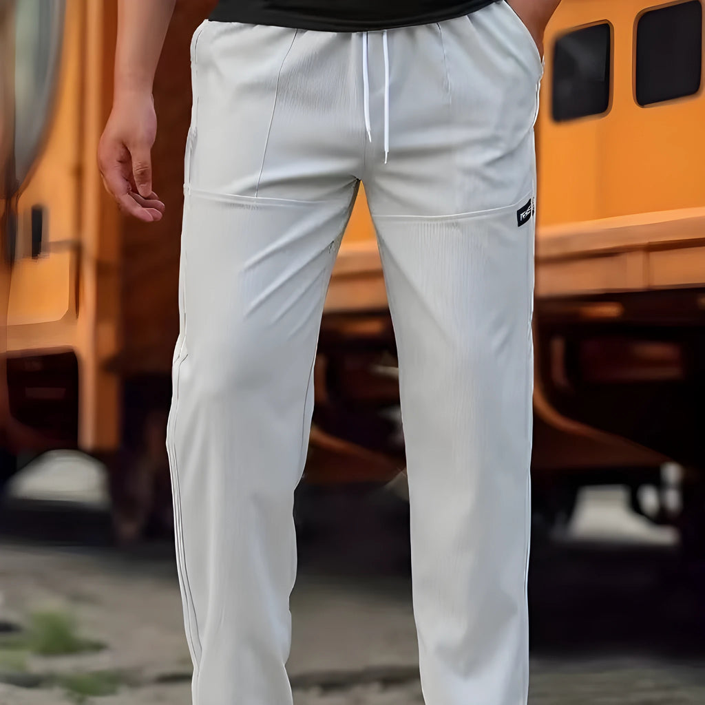 Men's lightweight polyester trousers for spring and autumn in light grey colour