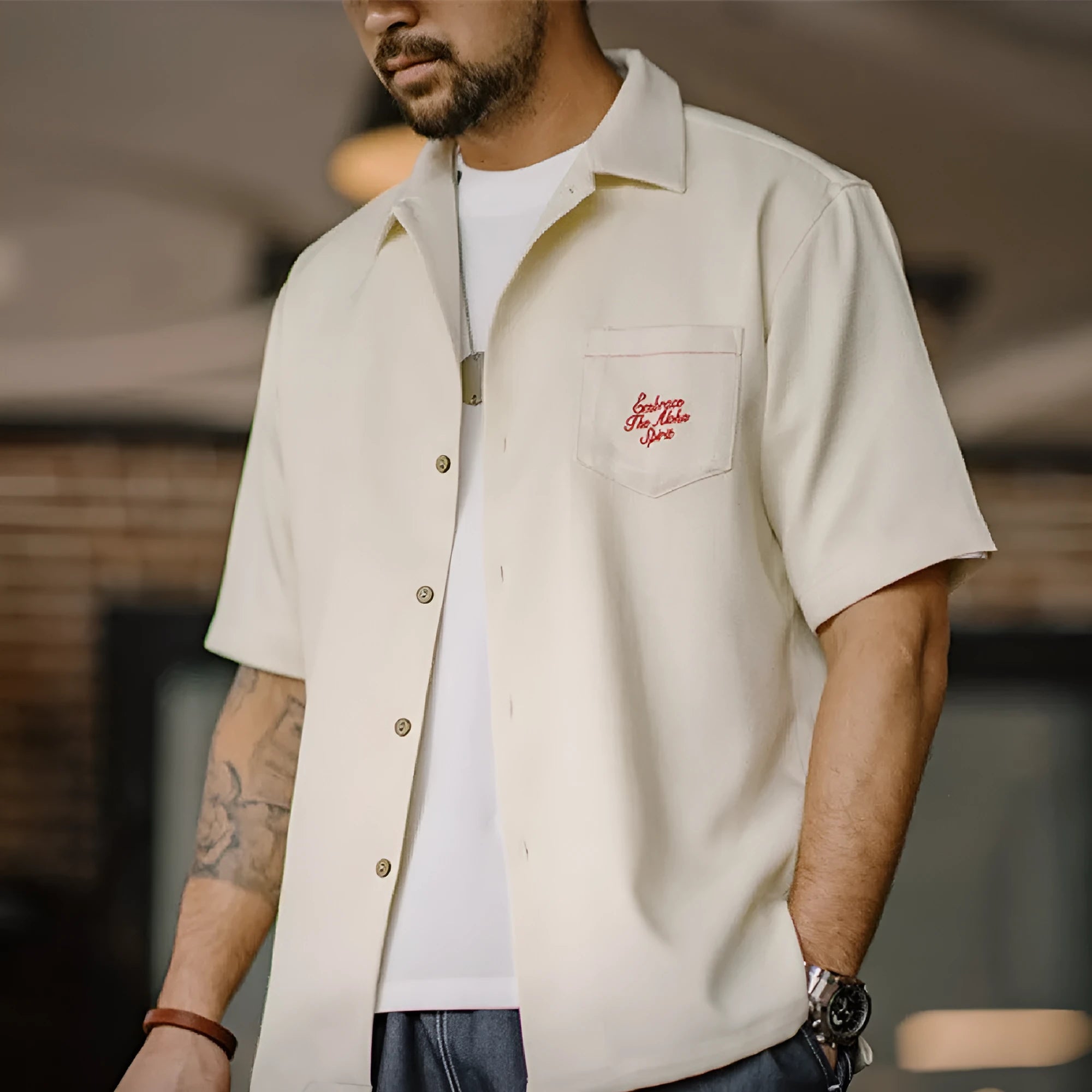 Men's light apricot Cuban collar shirt with bamboo plant pattern detail