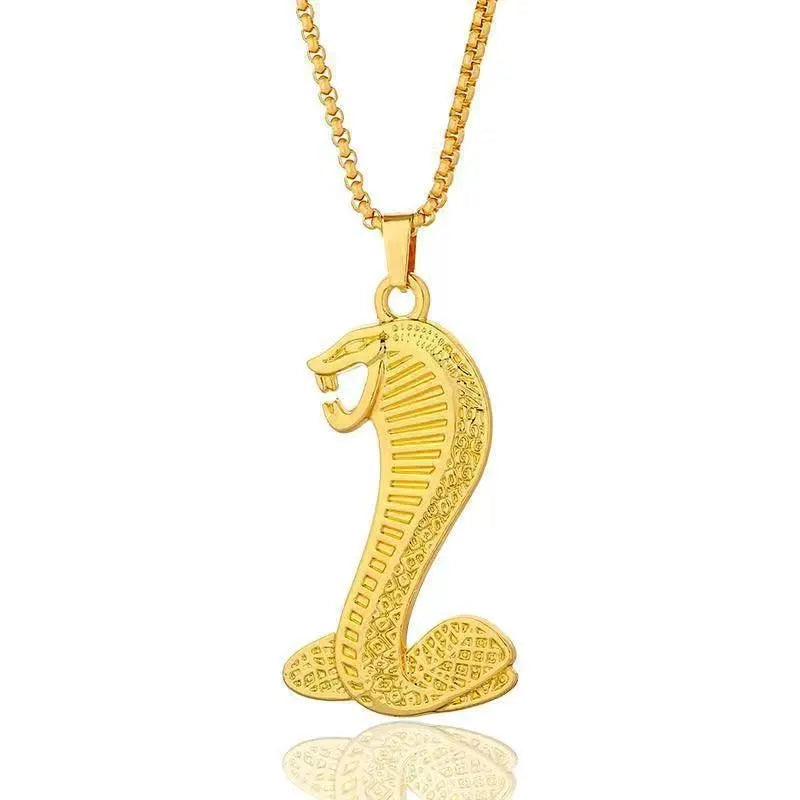 Geometric gold-colour alloy pendant necklace with an inlaid zircon stone centrepiece.