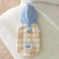 Blue corduroy dog hooded vest with chessboard grid pattern and traction hood design