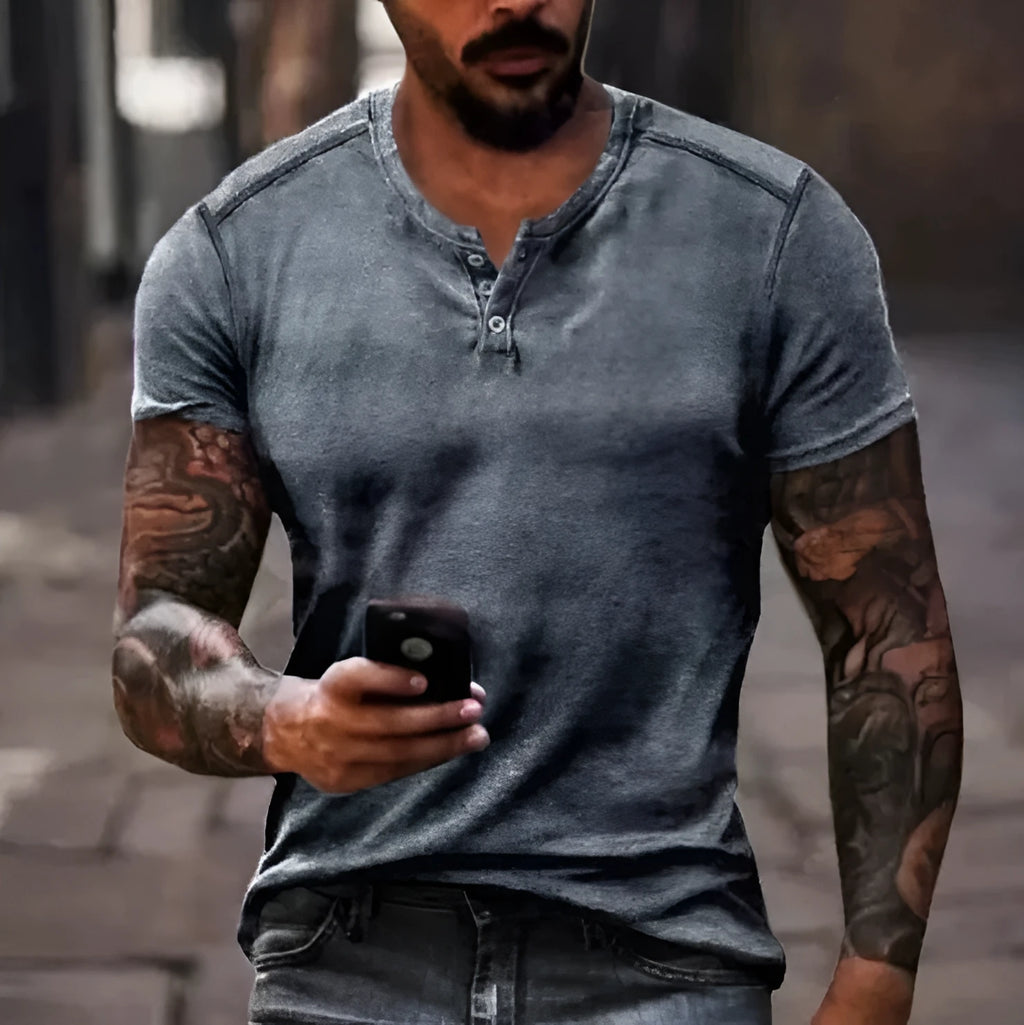 Men's short sleeve sports T-shirt with lapel button detail in bird eye cloth polyester.