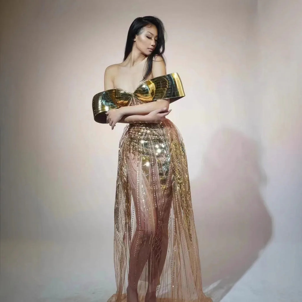 Gold strapless sequined dress with tulle skirt and high-leg split, sleeveless tube top design