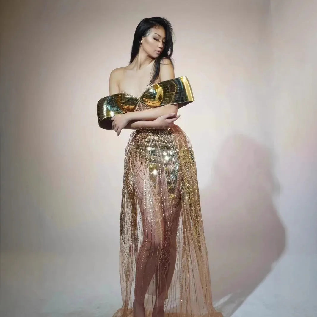 Gold strapless sequined dress with tulle skirt and high-leg split, sleeveless tube top design