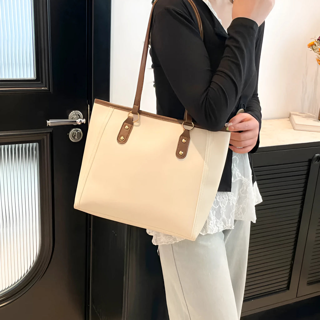 Korean style black PU shoulder underarm bag with a sandwich pocket and horizontal square shape.