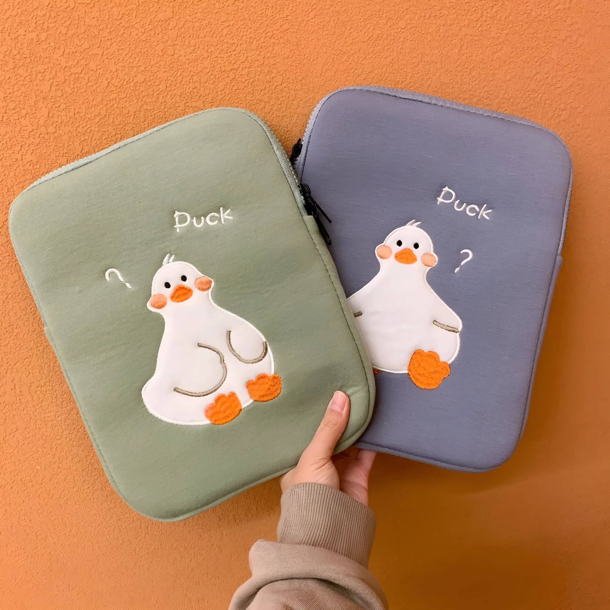Blue cotton tablet case with cartoon duck embroidery and zipper closure for 11-16 inch devices