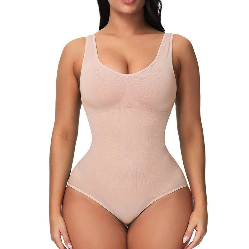 Seamless women's bodysuit shapewear in apricot colour on a hanger, showing its one-piece design.