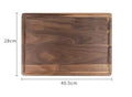 Black walnut wood cutting board with juice groove and side handle