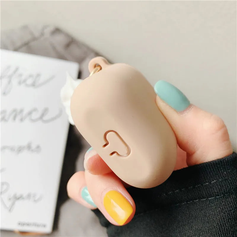 Silicone case for Apple AirPods 2 with cylindrical ice cream swirl design showing charging port cutout