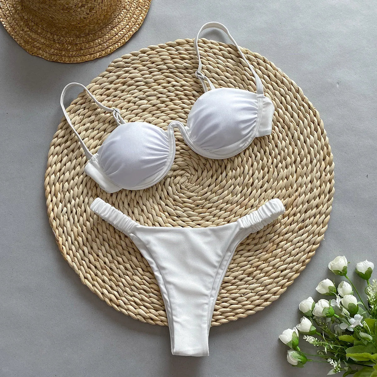 Women's khaki underwire bikini swimsuit with split bottom briefs on a mannequin.