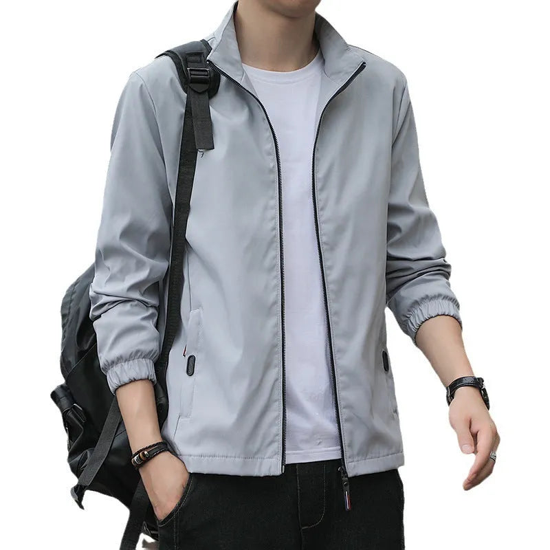Men's loose-fit Korean-style casual jacket with zipper pockets in multiple colour options including blue, black and grey