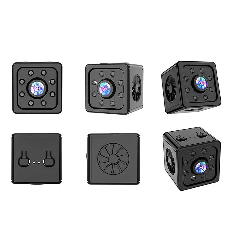 Black cubic Remote Network K13 Sports Camera on a table with its mounting bracket and data cable.