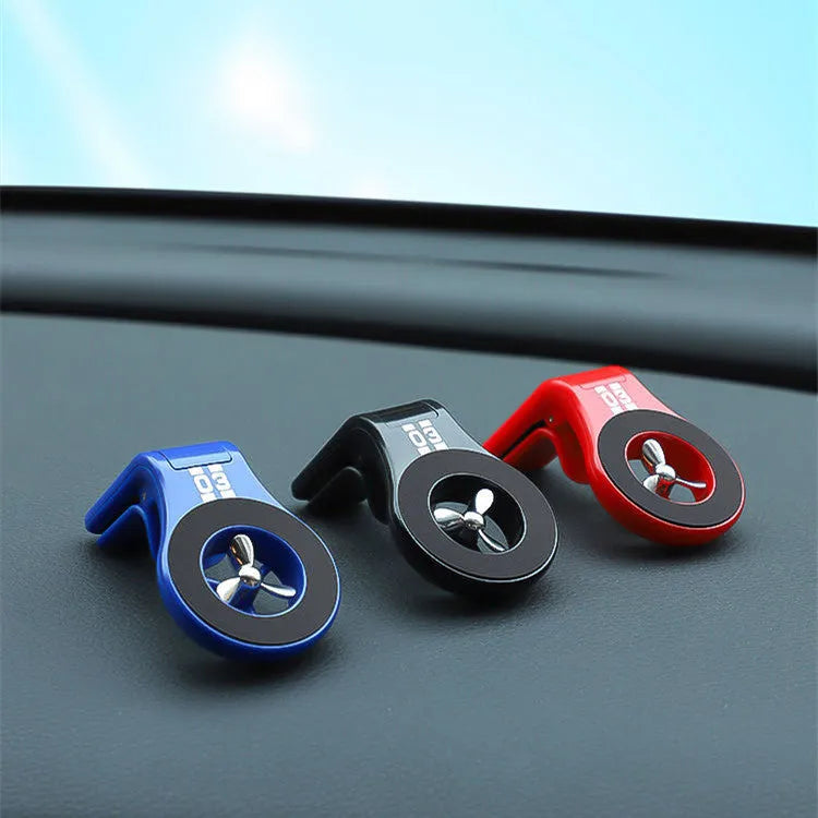 Universal magnetic car phone holder mounted on vehicle air vent with adjustable bracket and fragrance slots