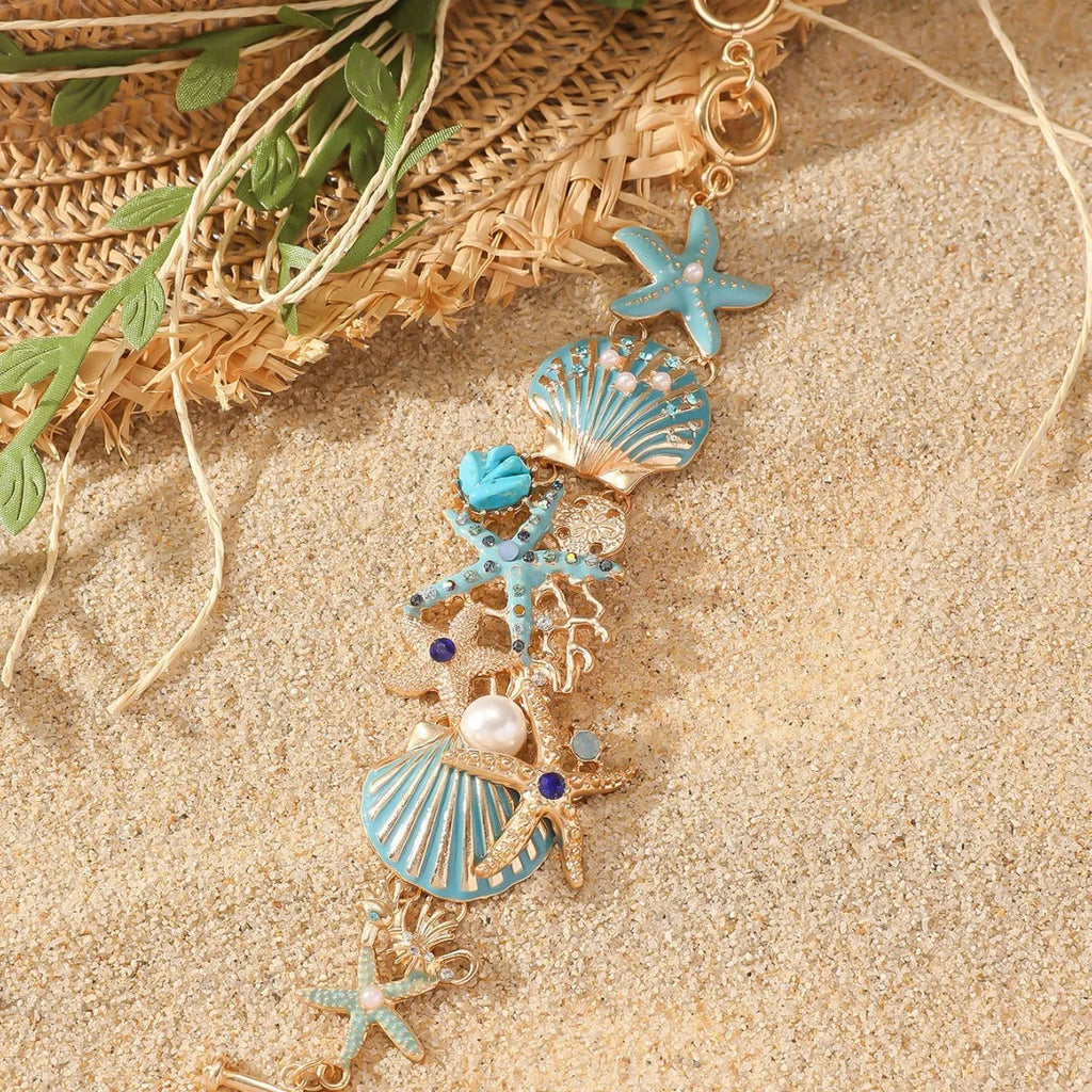 Women's alloy bracelet with boat anchor and starfish design in turquoise, red, or blue.