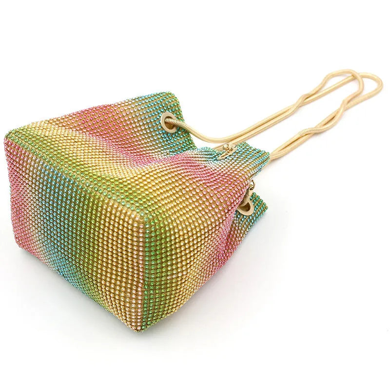 Soft rhinestone bucket bag with sparkling fabric texture in a selected colour