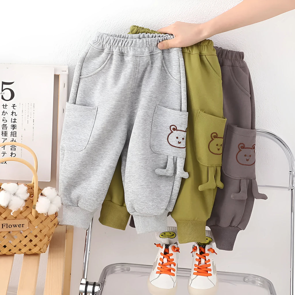 Boys' velvet sport pants in gray, green, and brown with elastic waistband and drawstring