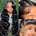 Black medium-length curly synthetic wig with full-head coverage and defined wave pattern