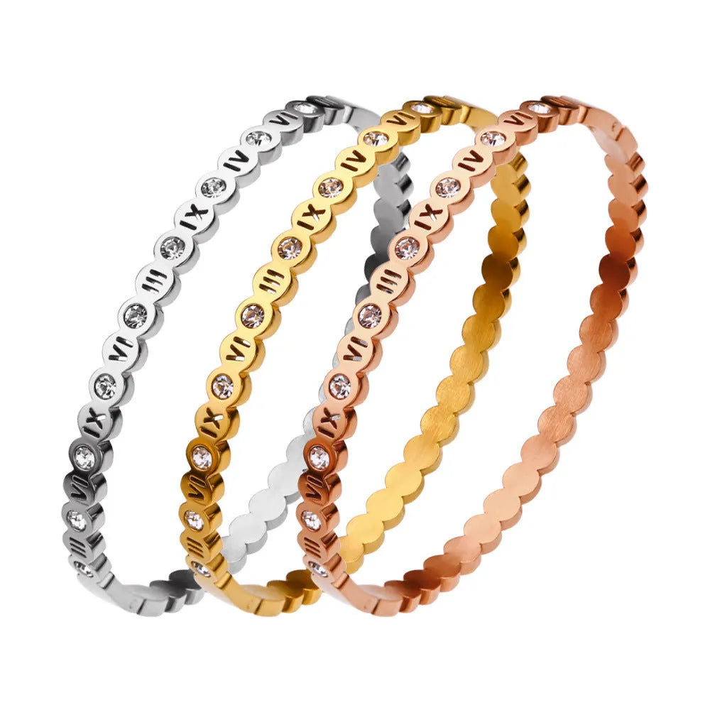 Korean style titanium steel bracelet with numerical design in gold, rose gold, and steel colour options.