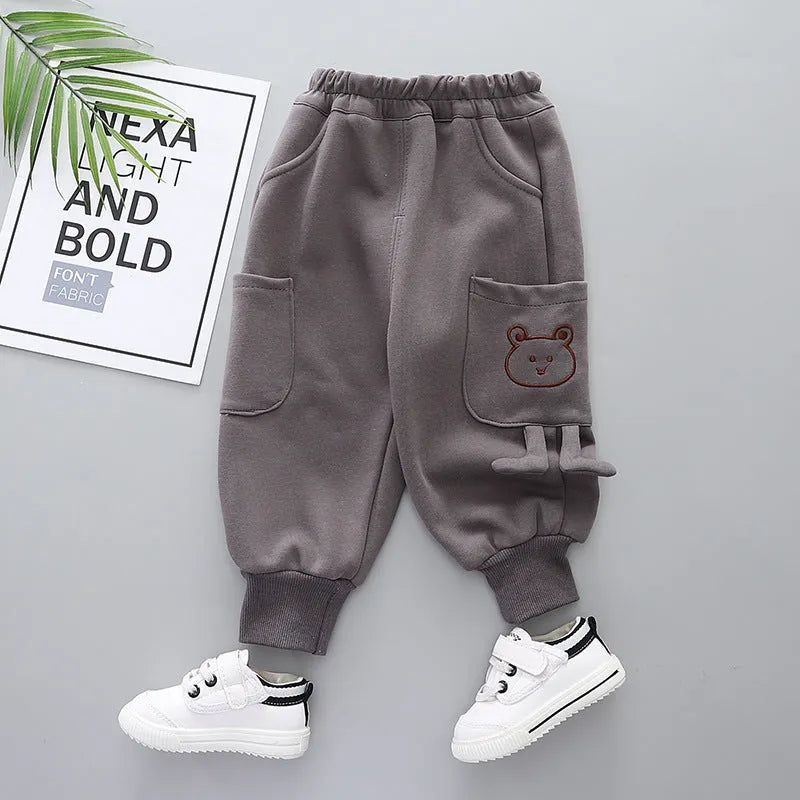 Boys' velvet sport pants in gray, green, and brown with elastic waistband and drawstring