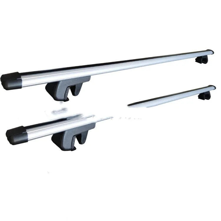Alloy roof rack crossbars for a General Motors SUV, shown adjusted to length.