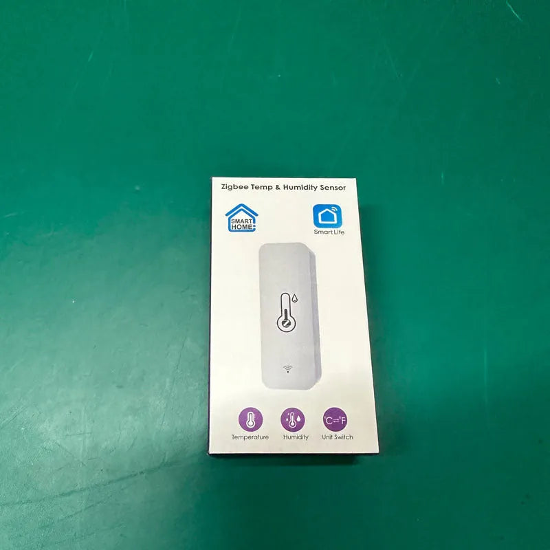 WiFi and Zigbee temperature humidity sensor with ABS plastic casing measuring 72mm