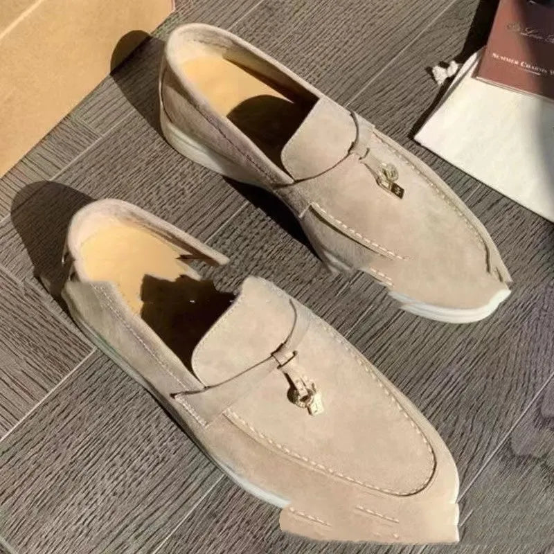 Gommino slip-on loafers with high-top design, round toe with steel head, and sewing line detail on artificial PU upper