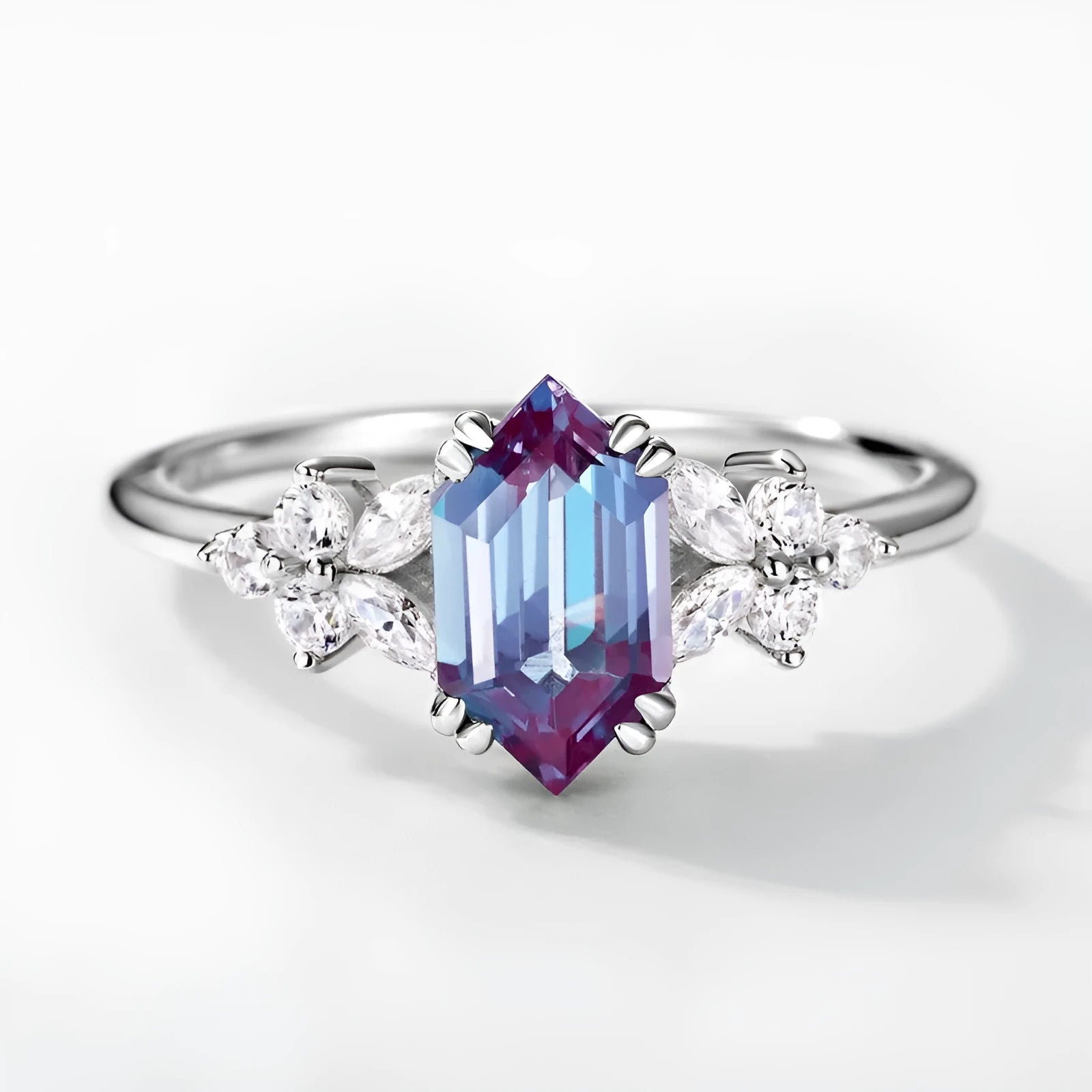 Women's Alexander stone ring with silver electroplated geometric band on neutral background