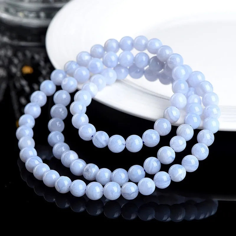 Blue agate bracelet with natural striped patterns, 6-6.8mm scattered beads featuring Ruyi design elements