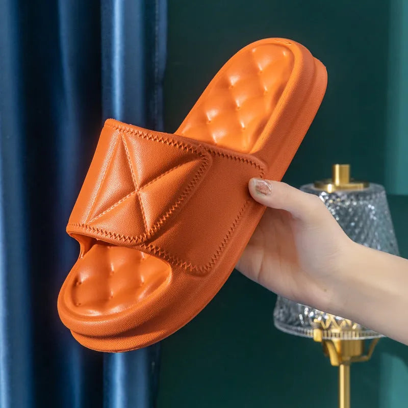 A pair of thick-soled EVA foam bath sandals in a chosen colour, showing the non-slip sole pattern.