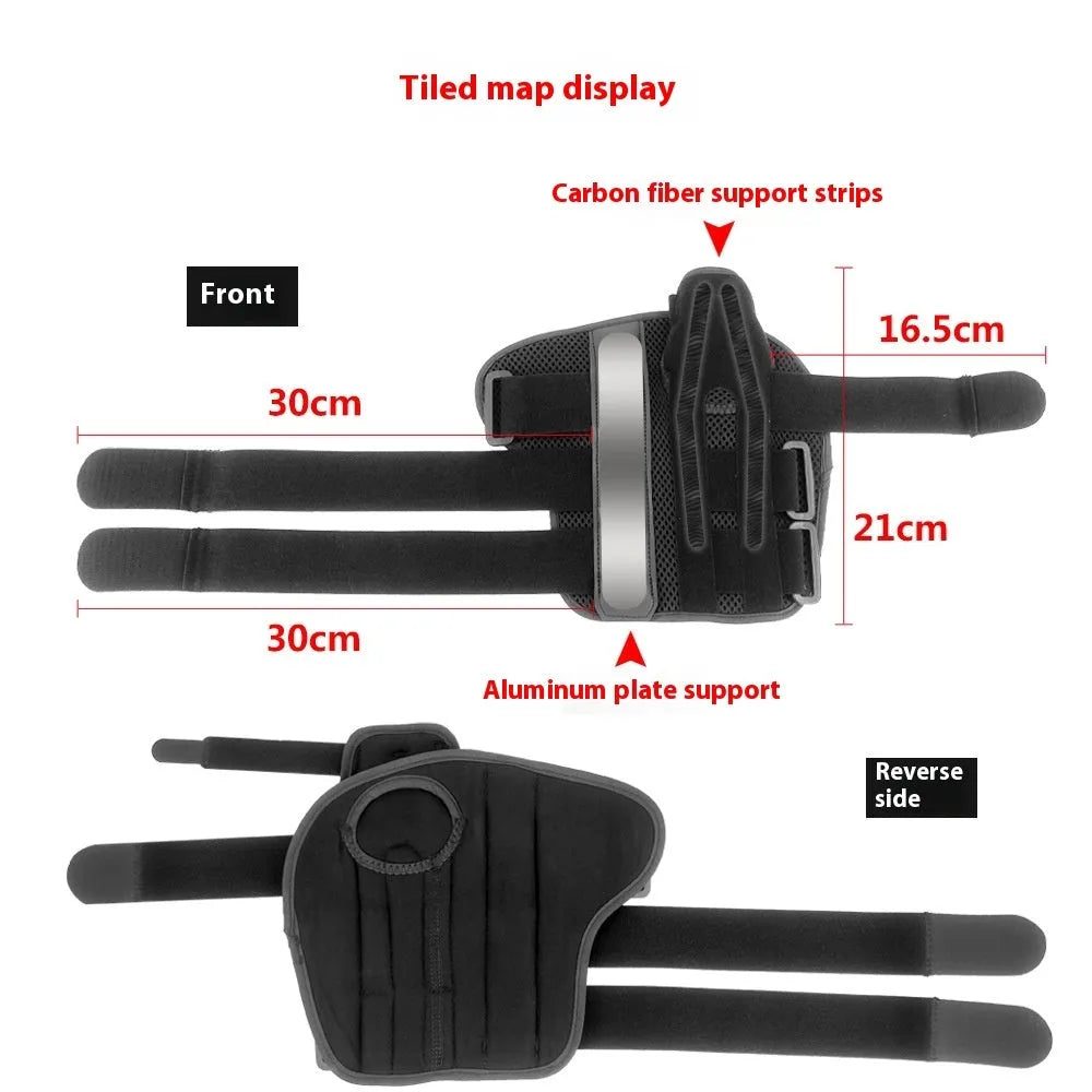 Black carbon fibre wrist guard with grey edging and a thumb strap, shown on a hand.