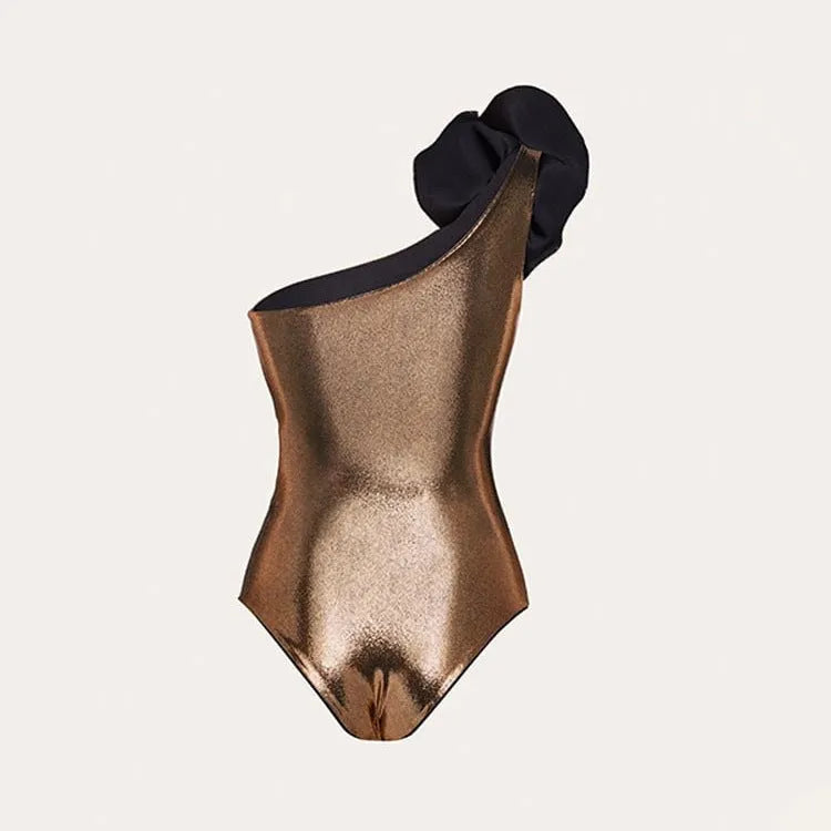 Gold coloured halter neck one piece swimsuit with a handmade hollow out flower design on the front.