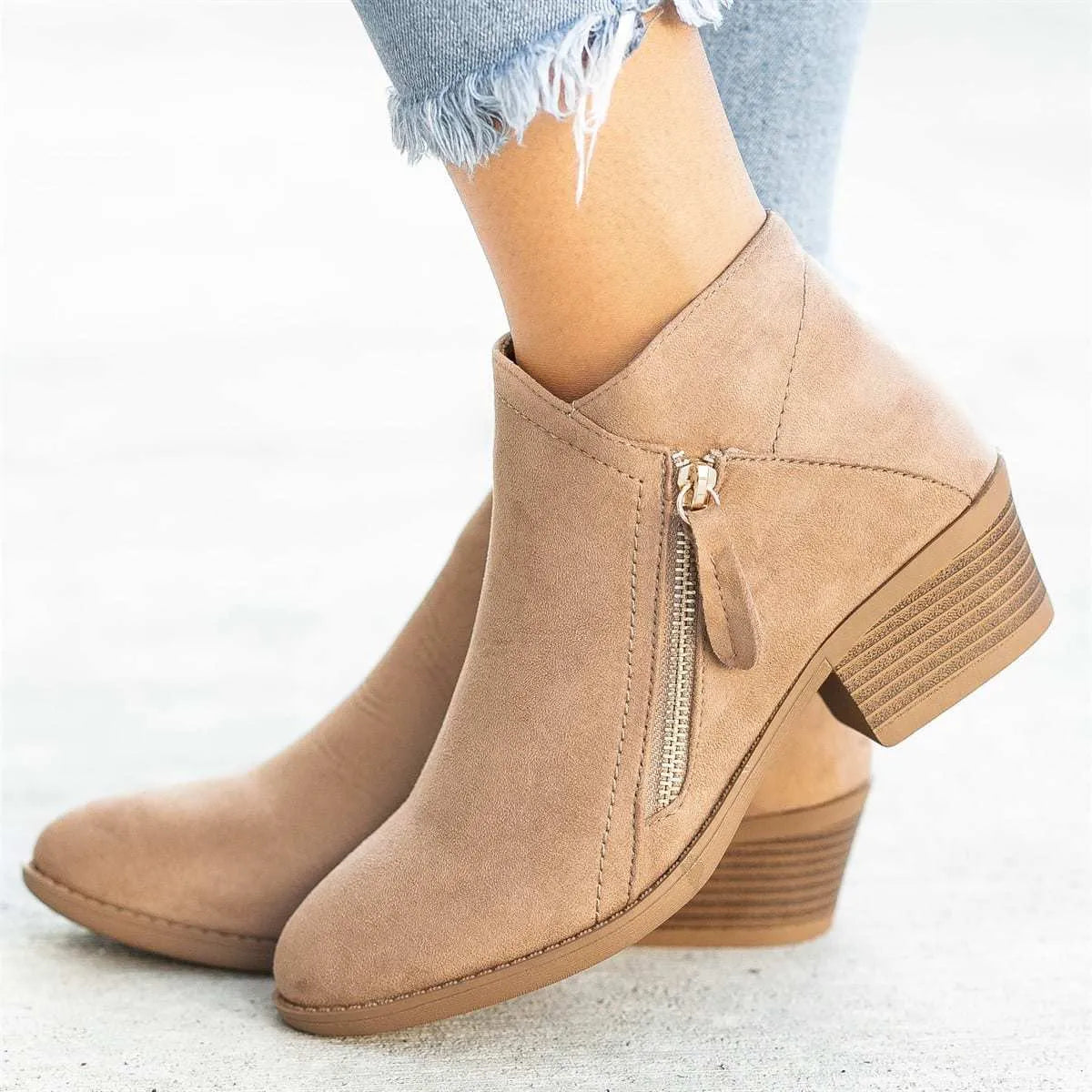 Women's suede Dr. Martens ankle boots with a side zip and chunky heel in beige colour