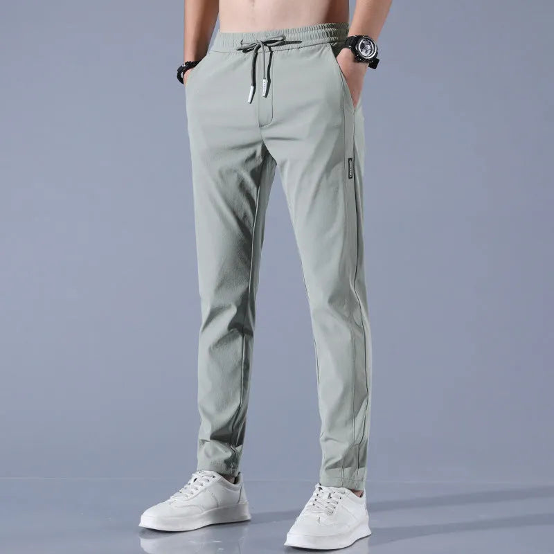 Men's summer ice silk pants in light green, straight-leg stretch business casual trousers