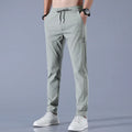Men's summer ice silk pants in light green, straight-leg stretch business casual trousers