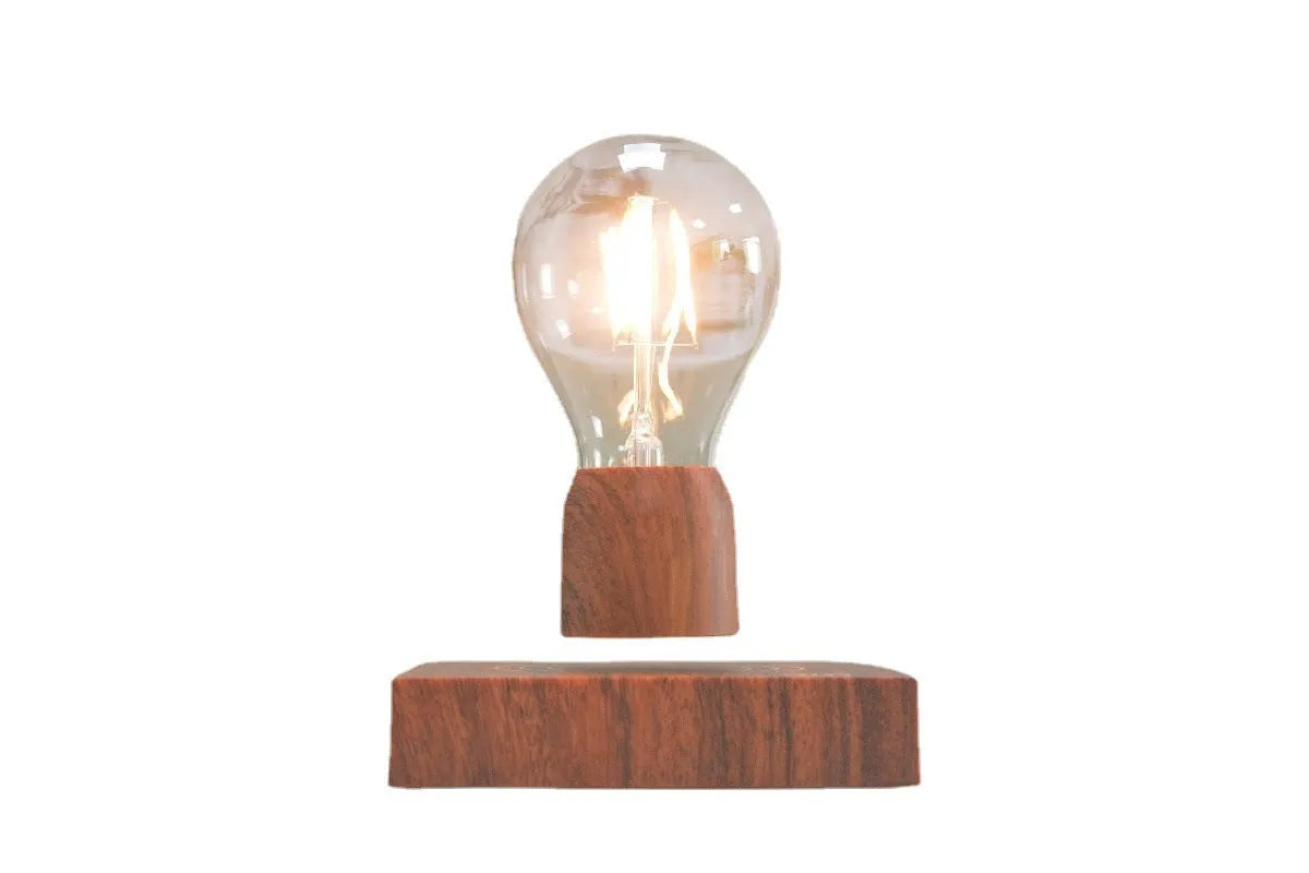 Magnetic levitation floating light bulb on imitation wood base with choice of international plugs.