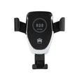 Black car wireless charger mounted on vent with iPhone secured by automatic clamping arms