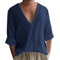 Men's solid colour V-neck long sleeve t-shirt in washed cotton linen blend on a hanger.