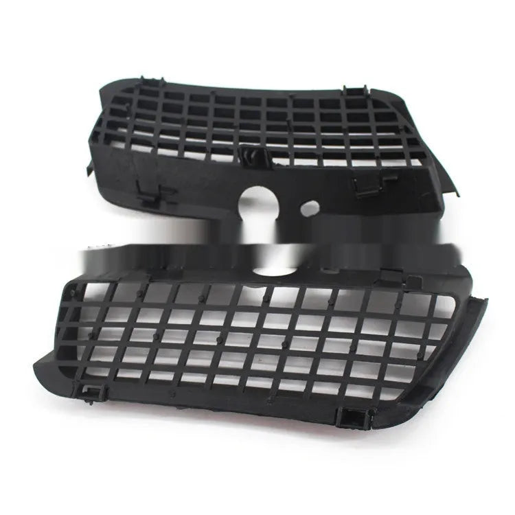Black ABS plastic Volkswagen Golf 3 front fog light cover and lower grille replacement pair.