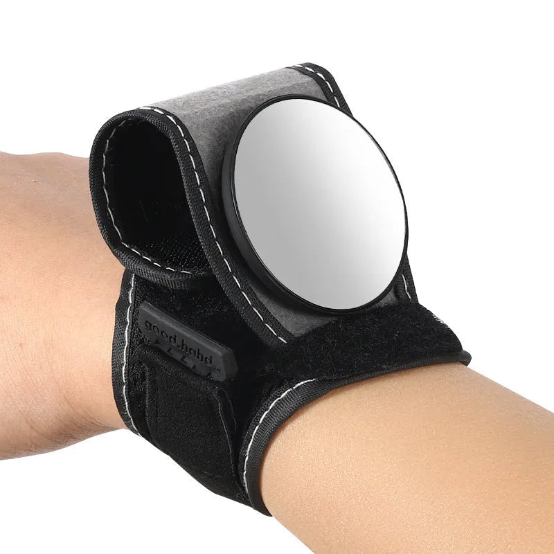 Black nylon bicycle wrist-mounted rear-view mirror for cycling safety.