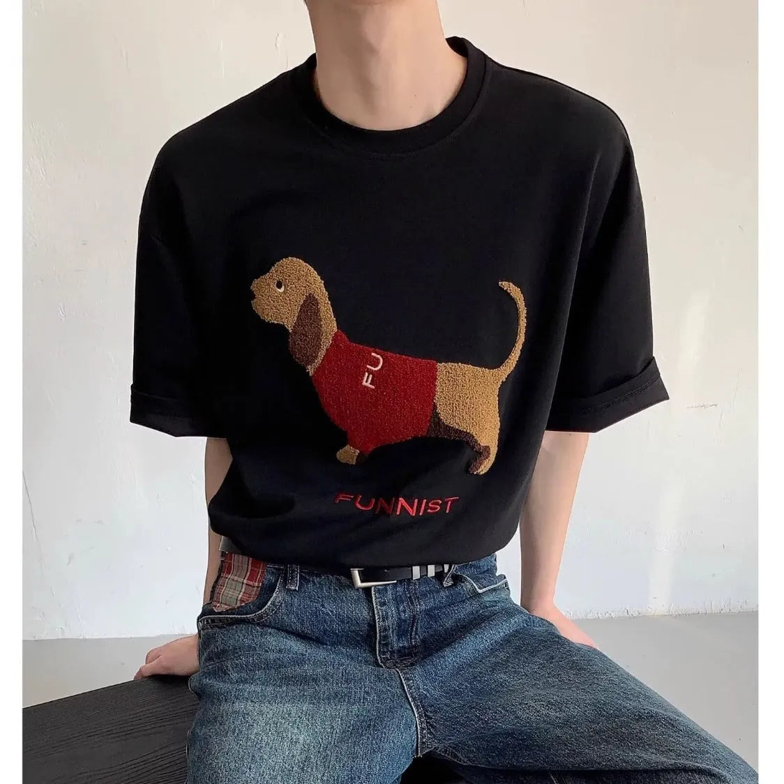 Grey men's t-shirt with an embroidered sausage dog design on the front.