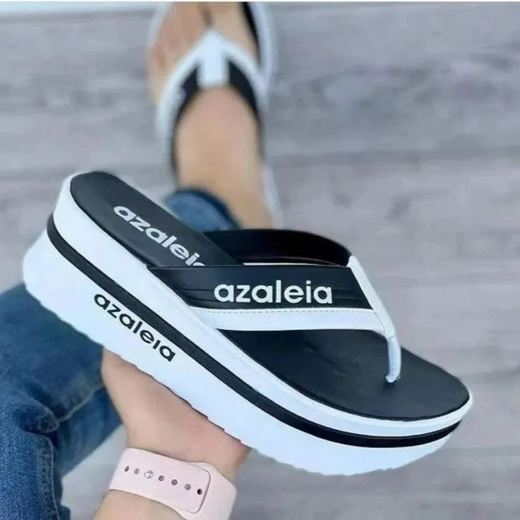 Women's solid colour platform slippers in PU leather with herringbone toe design