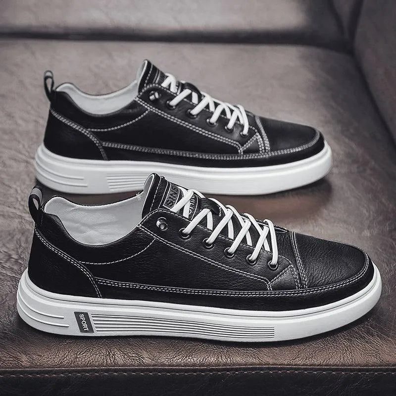 Men's white PU leather casual sneakers with a flat bottom and low heel on a plain background