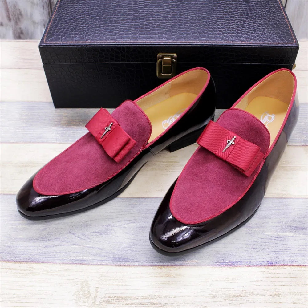 Men's glossy patent leather low-top shoes with a tassel in black, shown from a side view.