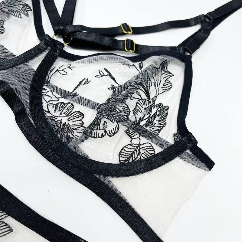 Black women's lace mesh three-piece set with floral print, showing top, pants, and waist ring.