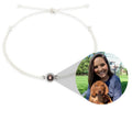 Handcrafted custom photo projection bracelet in silver with white rope, featuring alloy pendant with gold-plated inlaid artificial gemstones