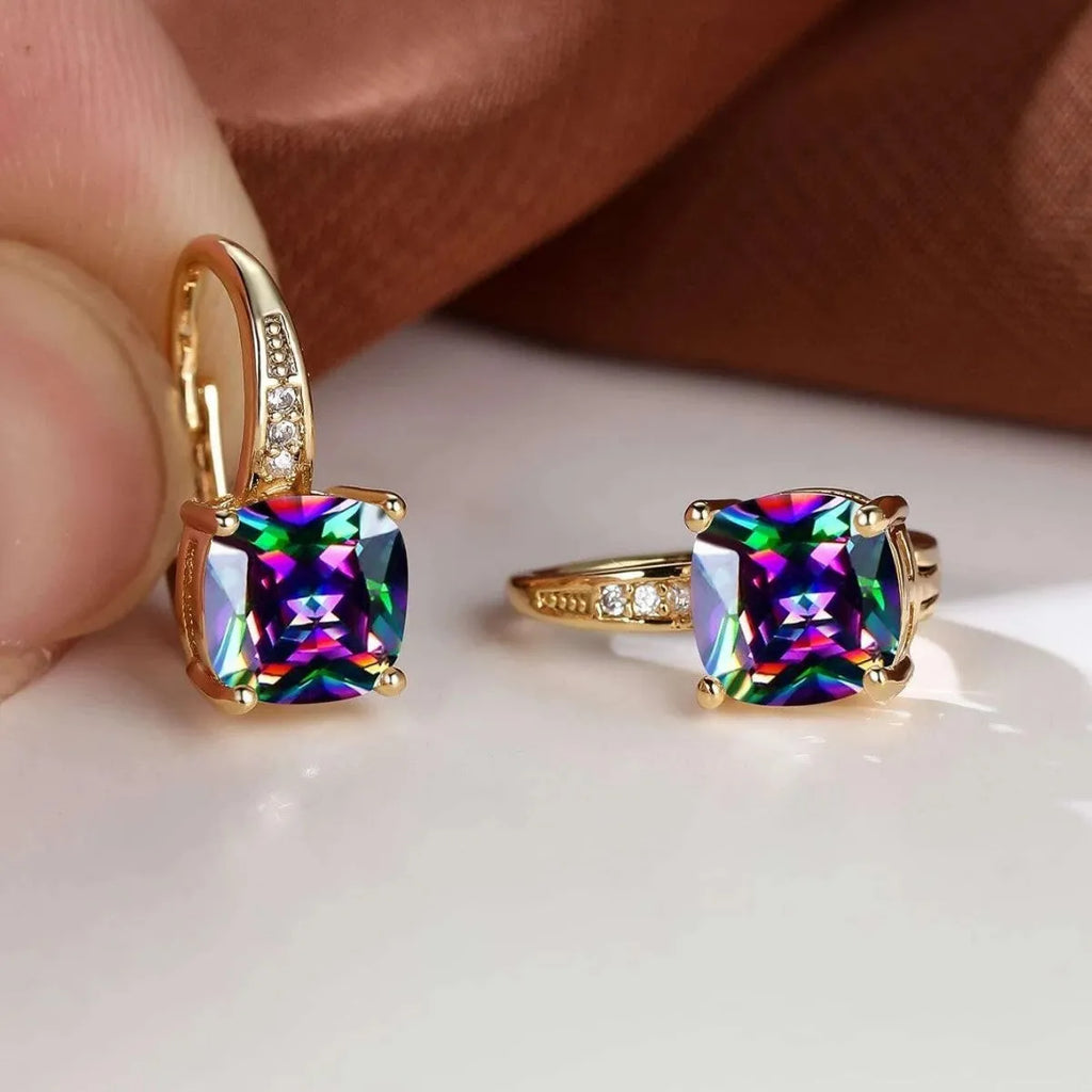 Square geometric moissanite ear clip in gold electroplated finish on copper.