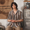 Grey men's short sleeve shirt with Cuban collar and jacquard pattern, shown in slim fit