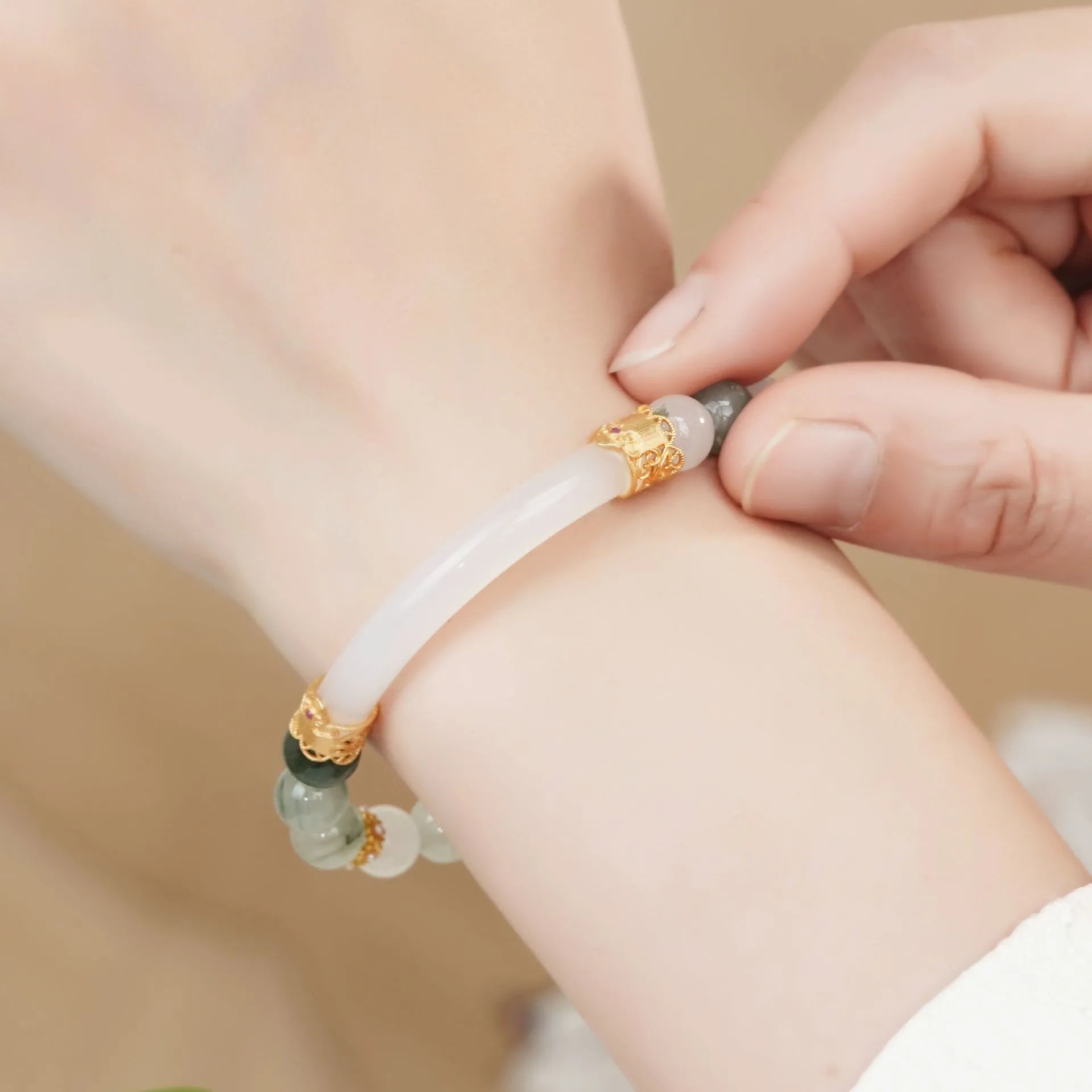 Emerald green Tian Shan Cui jade bracelet with floating flower girl half design and round elements