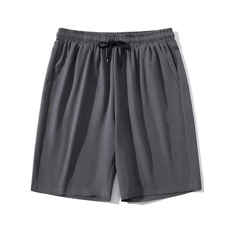 Men's cropped ice silk sports casual pants in quick-drying nylon, shown in blue colour