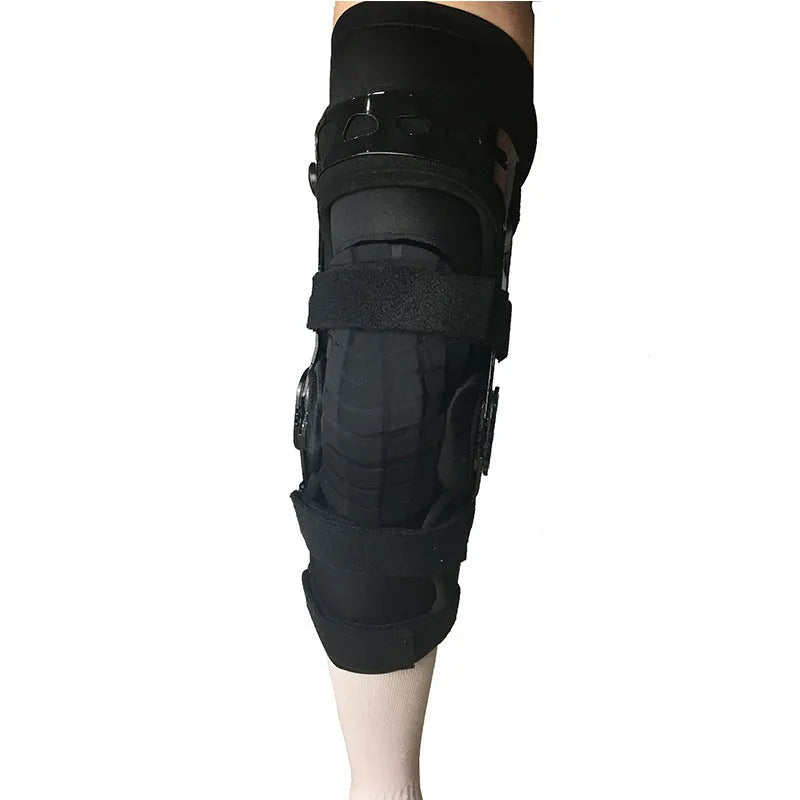 Black anterior ligament knee pad with plastic hinge components and sponge padding